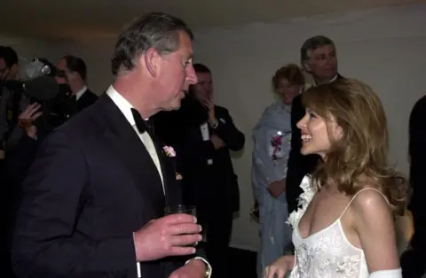 PA The Prince of Wales and Kylie Minogue during the "Its Fashion" charity gala dinner at Waddesdon Manor, Buckinghamshire, on 11 June 2001