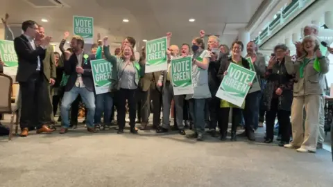 Green celebrating in Mid Suffolk