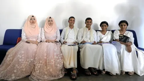 Reuters Twins pose for photographs at the Sri Lanka Twins event in Colombo, Sri Lanka, on 20 January 2020