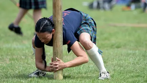 Getty Images Female Highland Games athlete