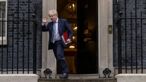 Dan Kitwood/Getty Images Boris Johnson leaves 10 Downing Street to attend the weekly Prime Minister's Questions