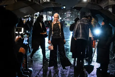 Chanel Metiers d'Art: Models turn Manchester street into a catwalk - BBC  News