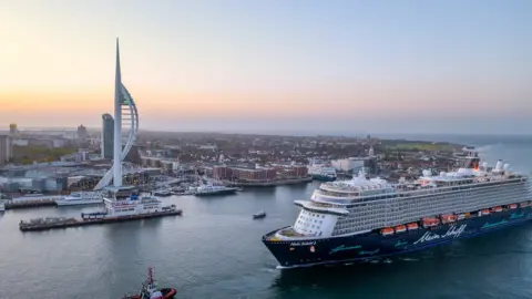 Marcin Jedrysiak Mein Schiff 3 in Portsmouth Harbour.