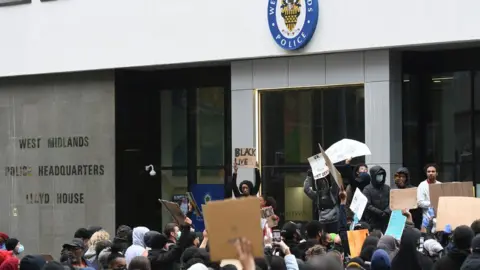 PA Media Demonstrators outside West Midlands Police Headquarters