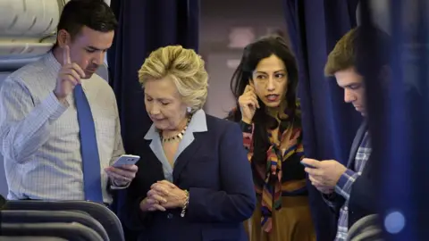 AFP/getty clinton and abedin