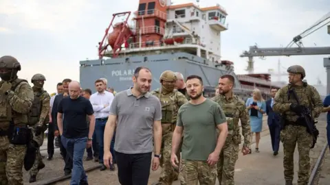 Telegram/Zelensky President Zelensky made an unannounced appearance in the port of Odesa alongside his minister for Infrastructure Oleksandr Kubrakov
