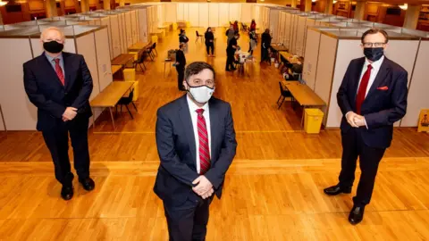 Pacemaker Robin Swann at the Covid-19 testing site at Queen's University Belfast
