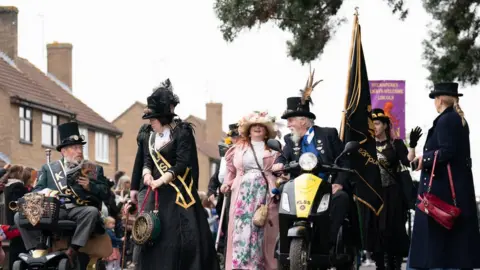 Joe Giddens/Pa Media King's Lynn Steampunk Society take part in the Spalding Flower Parade