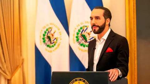 Reuters El Salvador"s President Nayib Bukele addresses the nation during a live broadcast