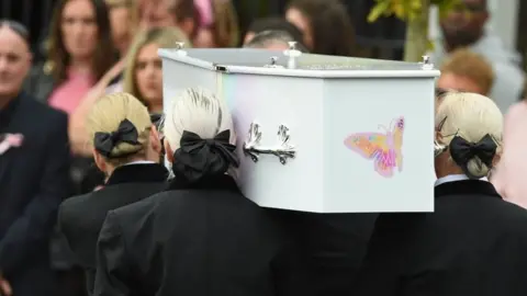 Reuters Olivia Pratt-Korbel's white coffin decorated with a pink butterfly