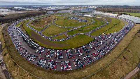 PA Media Cars stored at the Rockingham Motor Speedway circuit