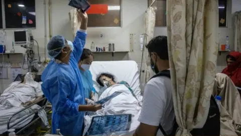 Reuters Delhi hospital Covid ward
