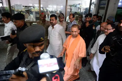 Getty Images Uttar Pradesh Chief Minister Yogi Adityanath visits the Baba Raghav Das Hospital in Gorakhpur on August 13, 2017