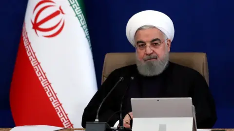 Getty Images Iran's President Rouhani said his government did not agree with the Iranian parliament's draft bill to increase nuclear activities