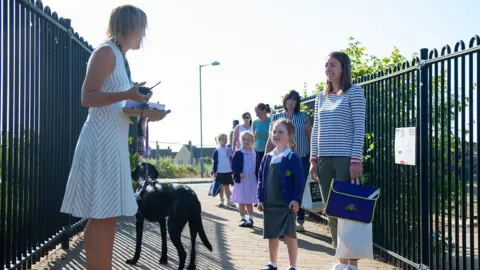 PA Media Children at a school in Norfolk