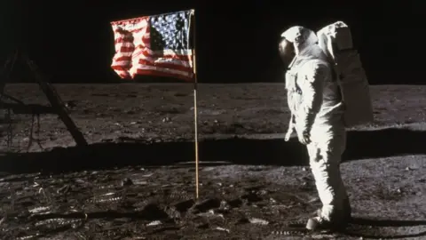 Getty Images Astronaut with the Stars and Stripes flag