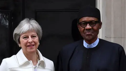 AFP British Prime Minister Theresa May and Nigerian President Muhammadu Buhari