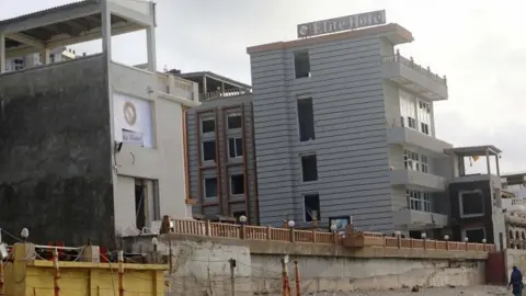 Reuters A general view shows a section of the scene of a militant attack at the Elite Hotel in Lido beach, in Mogadishu