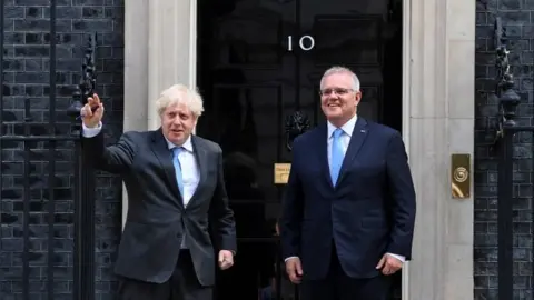 EPA Boris Johnson and Scott Morrison