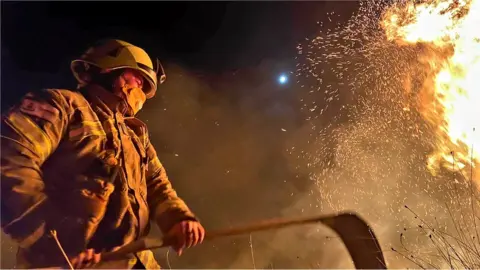 Firefighter Olly Jones Firefighter beats the fire