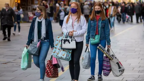 Getty Images Christmas shoppers