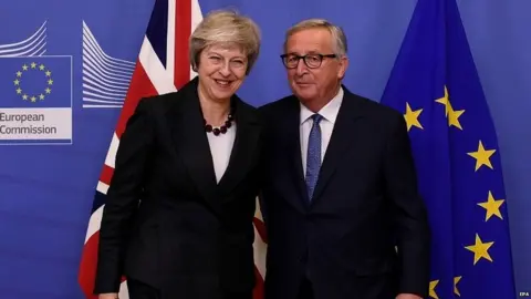 EPA Theresa May and Jean-Claude Juncker