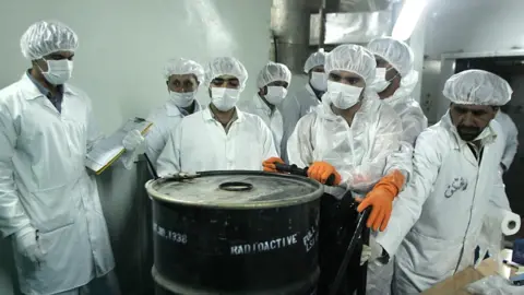 AFP Workers at a uranium conversion facility in Iran, pictured in 2005