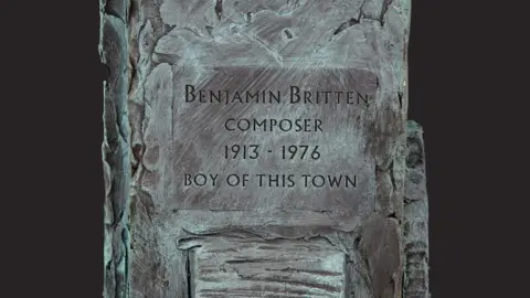 Ian Rank-Broadley/Britten as a Boy How the plaque on the statue will look, giving the years Benjamin Britten was born, 1913, and died, 1976