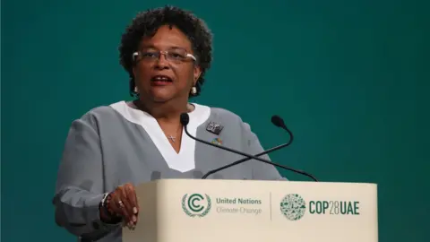 Getty Images Mia Mottley speaks during day two of the high-level segment of the COP28