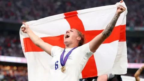 Getty Images Millie Bright after winning Euro 2022 with England