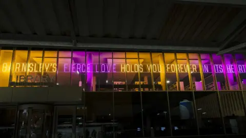 Barnsley Council Ian McMillan's neon Covid-19 memorial words, Barnsley library