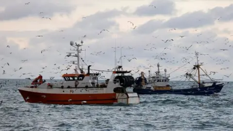 Reuters Fishing trawlers