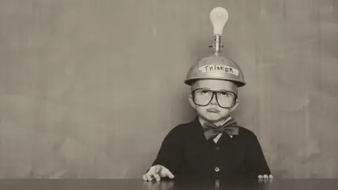 Getty Images Stock image of a child with a lightbulb above their head