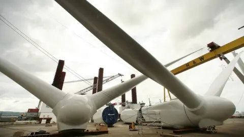 Peter Macdiarmid/getty images Wind turbines under construction