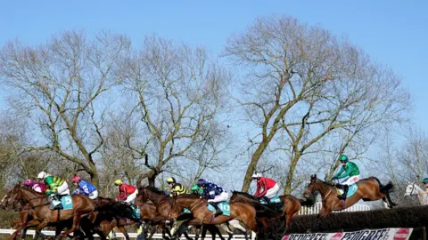 PA Media Runners and riders in action as they compete in the Boulton Group Midlands Grand National at Uttoxeter Racecourse, Staffordshire