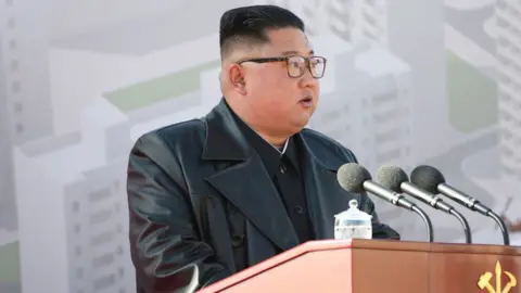 Getty Images North Korean leader Kim Jong-un opening a hospital last year