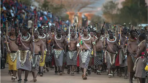 AFP King Mswati III arrives at the annual Umhlanga reed dance festival