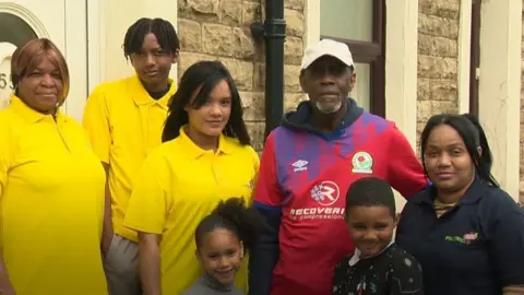 Blackburn family in street