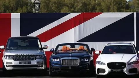 Getty Images Cars in front of union jack flag