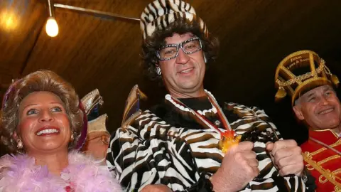 Getty Images Markus Söder and wife in carnival costumes, 2007