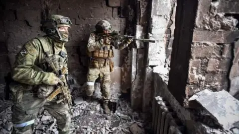 Getty Images Russian troops in Mariupol