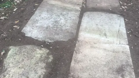 Gravestones on the ground