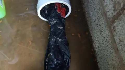 Guernsey Water Clothes flushed down drain