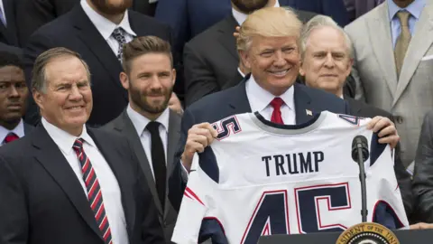 Getty Images Trump with New England Patriots