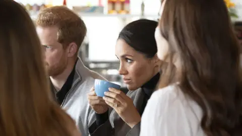 Getty Images Meghan and Harry at Maranui Cafe