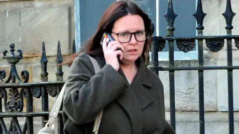 Spindrift Natalie McGarry speaking on a mobile phone