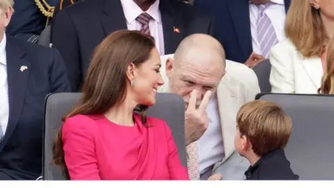 Getty Images Mike Tindall playfully warns Prince Louis of Cambridge that he will keep his eyes on him