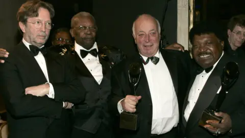 Getty Images Eric Clapton and B.B. King, presenters, with Seymour Stein and Percy Sledge, inductees at the 20th Annual Rock and Roll Hall of Fame Induction Ceremony, 2005