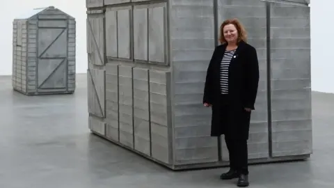 Getty Images Turner Prize-winning artist Rachel Whiteread next to a piece of work from her show 'Detached'