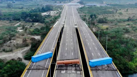 AFP Venezuela's military blocked the Tienditas Bridge to prevent US aid entering the country